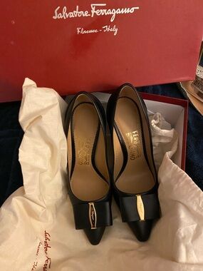 Salvatore Ferragamo Black Leather Pointed Pumps with Gold Bow Accent